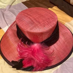 Pink hat with feathers